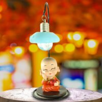 Miniature-Decorative-Buddha-Monk-Figurines-Sitting-below-lamp-Showpiece